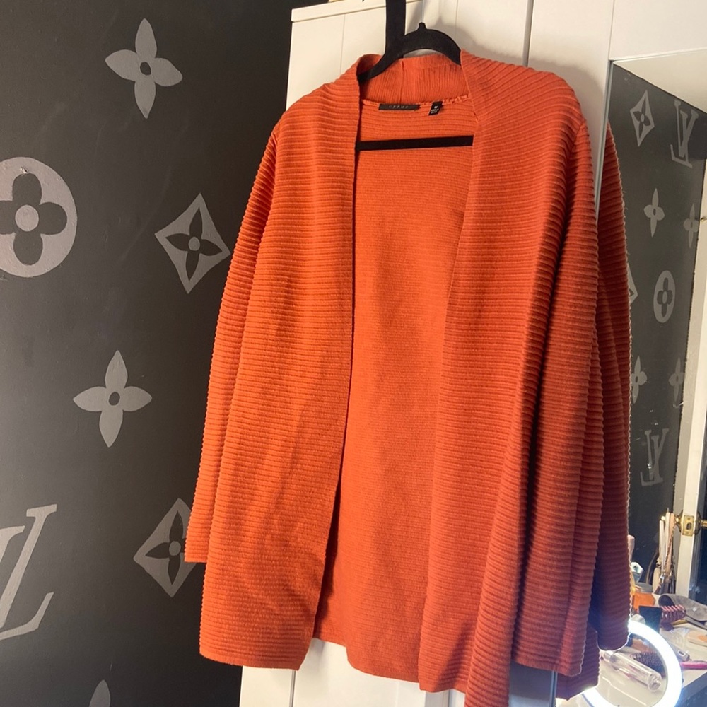 I would call color peach - a great layering piece never worn